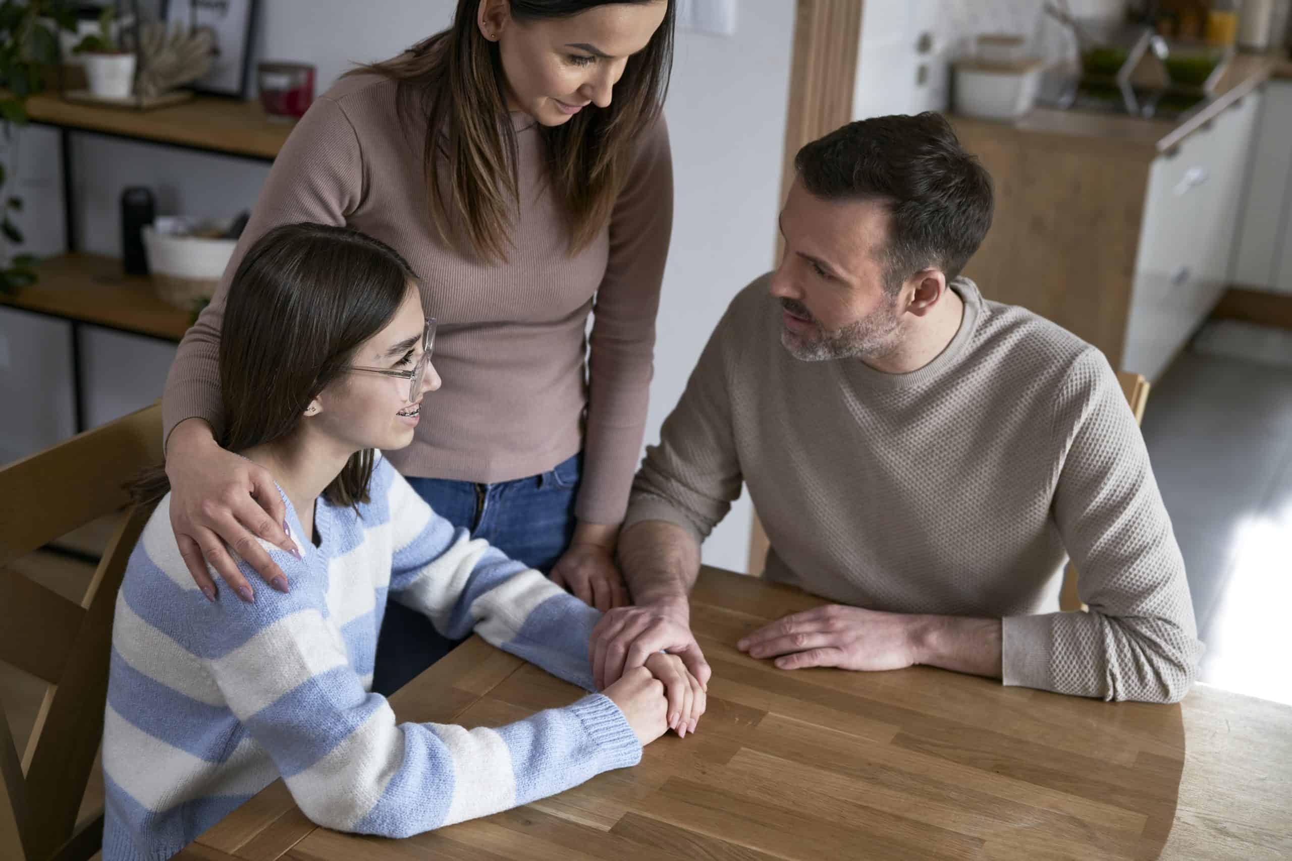 family talking about their estate plan at a table